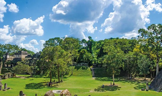 Female photographer shooting Guatemalan ruins