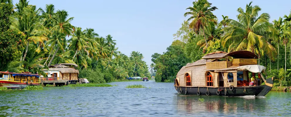 Top Tips For Visiting Kerala, India - a boat on the river