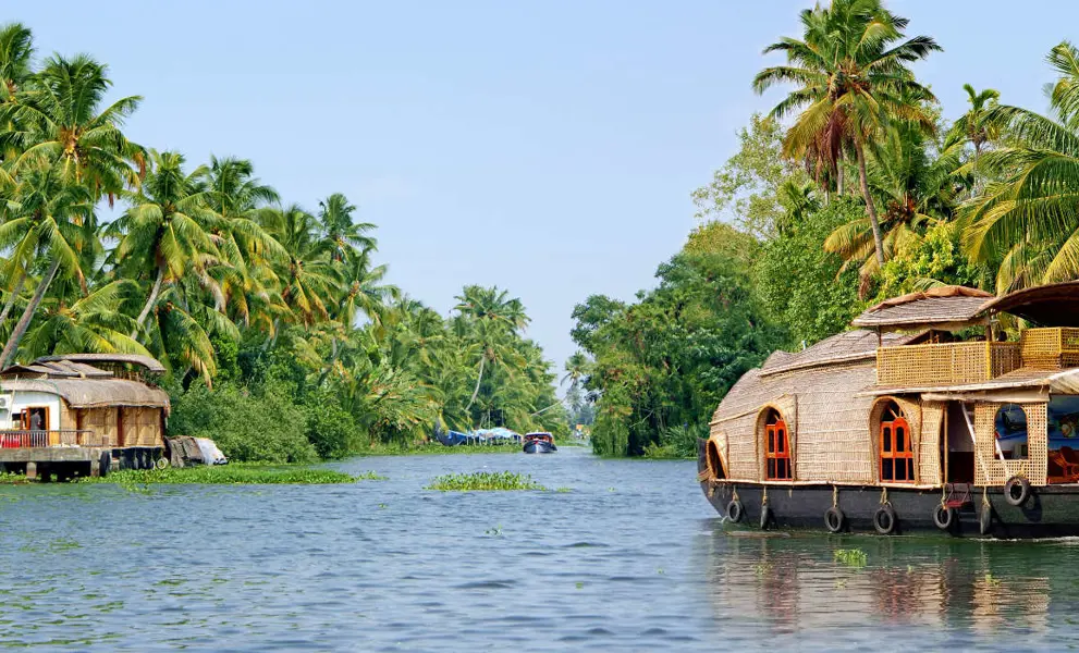 Top Tips For Visiting Kerala, India - a boat on the river
