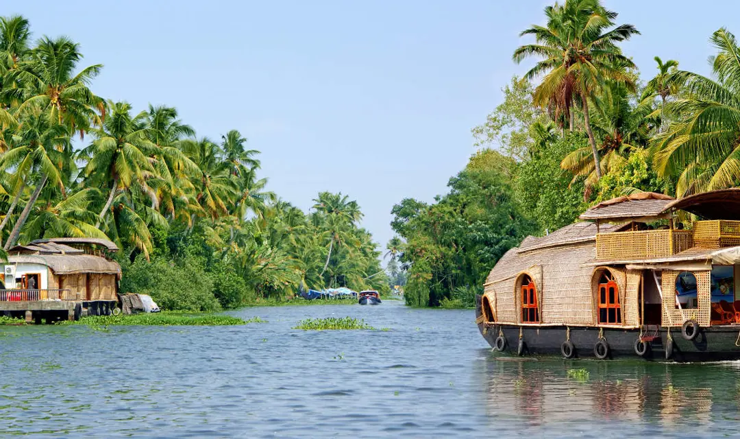 Top Tips For Visiting Kerala, India - a boat on the river
