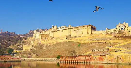 Temple on a hill above a lake in India