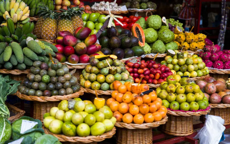 Fruits displayed in baskets in Funchal - things to do in Madeira