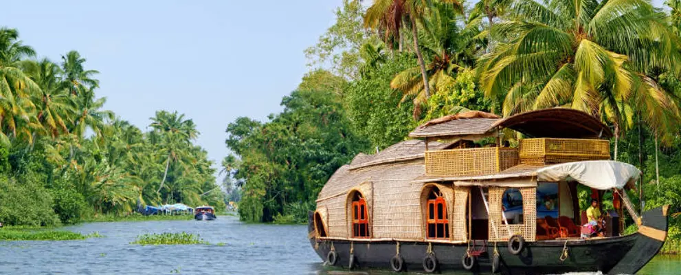 Top Tips For Visiting Kerala, India - a boat on the river