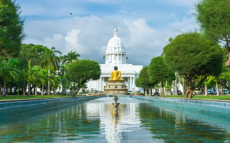 The golden Buddha statue at Viharamahadevi Park in Sri Lanka